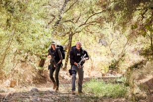 “Best Seller” – When Sam’s friend Tom Olsen finds himself being hunted down by enemies from his past, the NCIS team must find out who is after him, on the CBS Original series NCIS: LOS ANGELES, Sunday, Jan. 15 (9:00-10:00 PM, ET/PT) on the CBS Television Network, and available to stream live and on demand on Paramount+. Pictured (L-R): Daniela Ruah (Special Agent Kensi Blye) and Bill Goldberg (DOJ Agent Lance Hamilton). Photo: Sara Mally/CBS ©2022 CBS Broadcasting, Inc. All Rights Reserved.